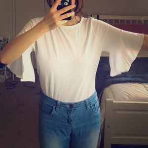 Elegant White blouse with bat sleeves